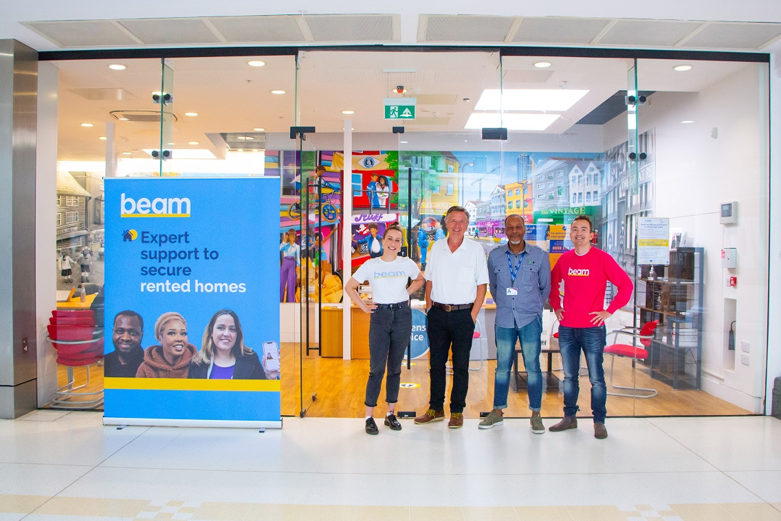 Picture showing Cllr Hugo Pound with staff from Beam in Royal Victoria Place